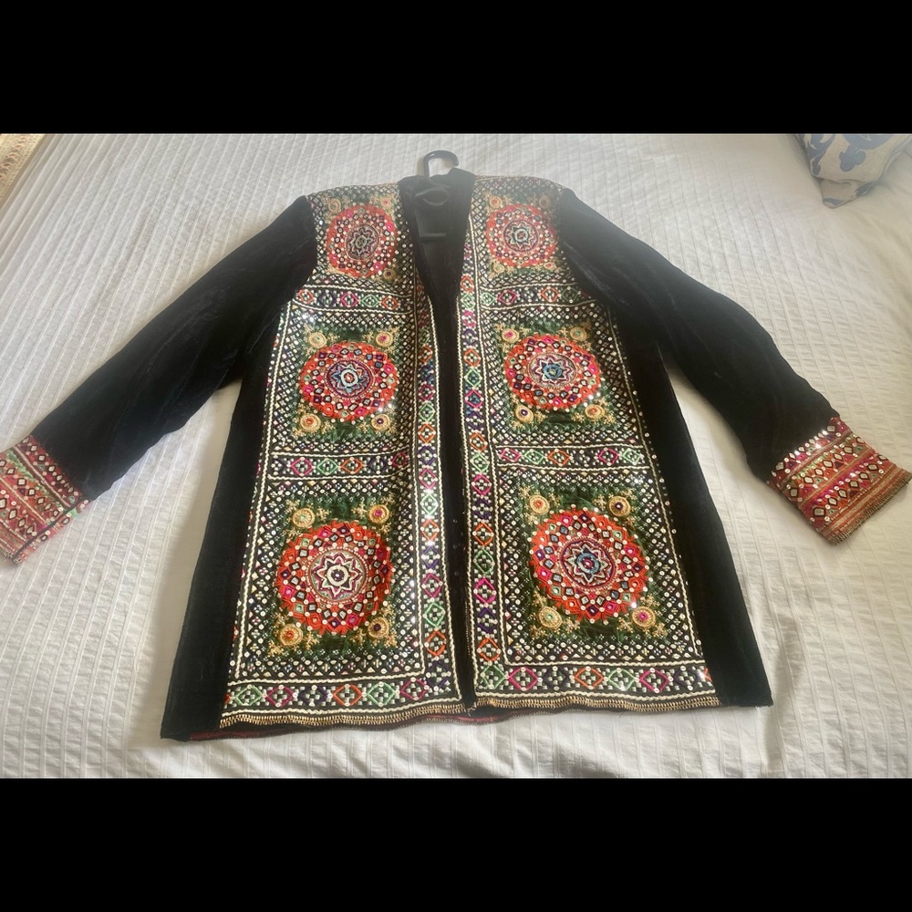 This is a beautiful vintage handmade embroidered jacket. One of a kind.